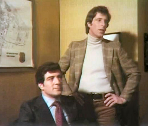 Palmer and Locke at a briefing.